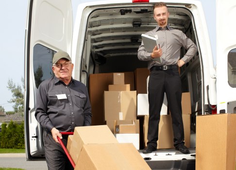 Office relocation planning in Isleworth with moving boxes and furniture