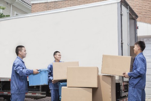 Man and van team starting a safe loading job with equipment
